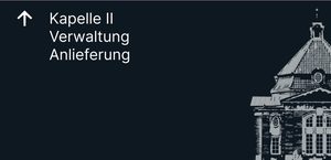 Wegweiser 1, Vorderseite: Pfeil ↑ Kapelle II, Verwaltung, Anlieferung